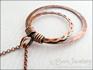 Copper double hammered ring pendant on belcher chain