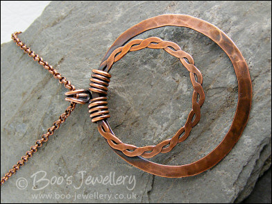 Copper double hammered ring pendant on belcher chain