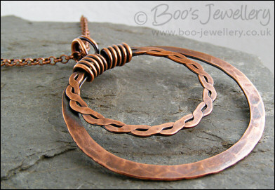 Copper double hammered ring pendant on belcher chain