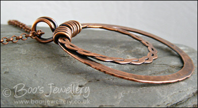 Copper double hammered ring pendant on belcher chain