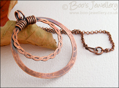 Copper double hammered ring pendant on belcher chain