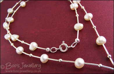 RESERVED:  Sterling silver and freshwater pearl liquid silver necklace