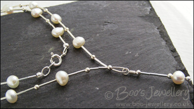 RESERVED:  Sterling silver and freshwater pearl liquid silver necklace