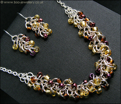 Shaggy Loops beaded necklace and earrings in amber tones
