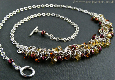 Shaggy Loops beaded necklace and earrings in amber tones