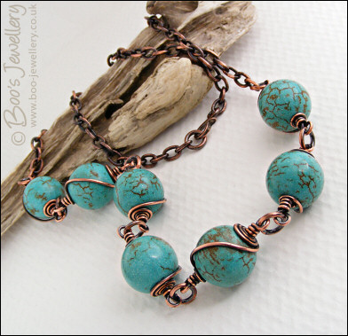 Antiqued copper spiral wrapped chalk turquoise necklace