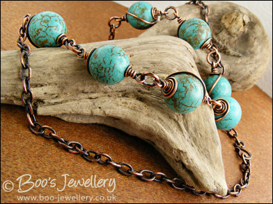 Antiqued copper spiral wrapped chalk turquoise necklace