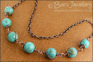 Antiqued copper spiral wrapped chalk turquoise necklace