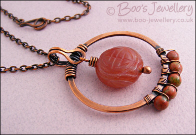 Carnelian and unakite copper circle pendant on chain