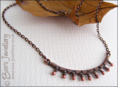 Reserved item - antiqued copper wrapped bud necklace and earrings