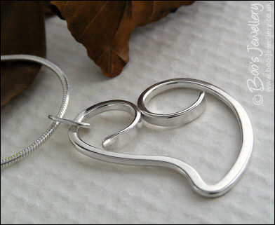 Curly Sterling silver heart pendant on snake chain