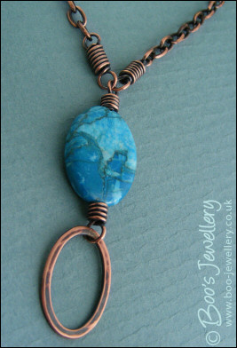 Turquoise veined jasper and copper oval necklace