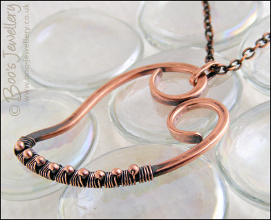 Antiqued copper heart pendant wire wrapped with beads