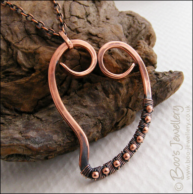 Antiqued copper heart pendant wire wrapped with beads