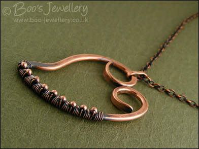 Antiqued copper heart pendant wire wrapped with beads