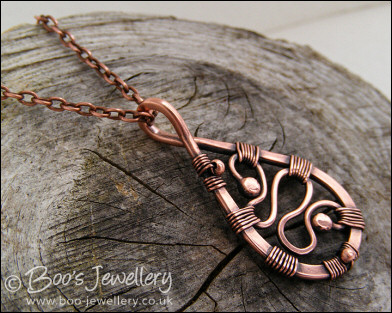Squiggle filled antiqued copper teardrop pendant