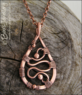 Squiggle filled antiqued copper teardrop pendant