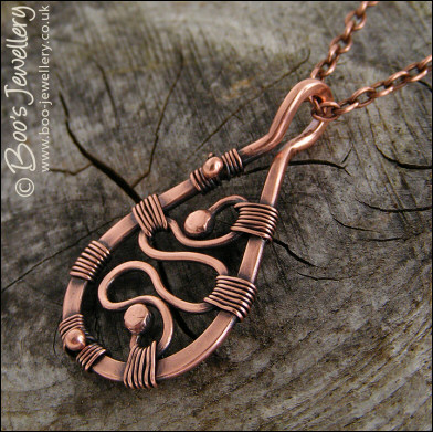 Squiggle filled antiqued copper teardrop pendant