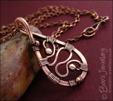 Squiggle filled antiqued copper teardrop pendant