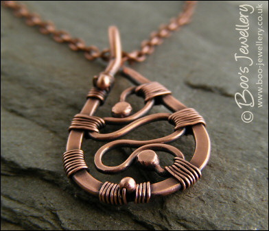 Squiggle filled antiqued copper teardrop pendant