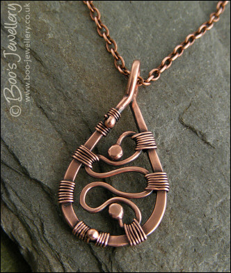 Squiggle filled antiqued copper teardrop pendant