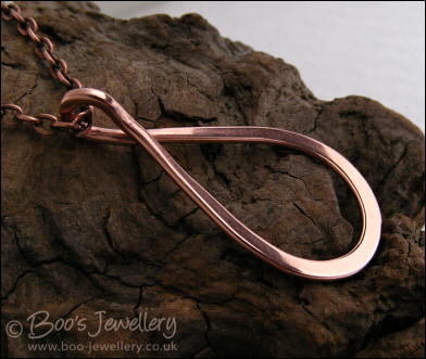 Polished copper teardrop loop pendant