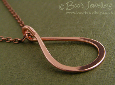 Polished copper teardrop loop pendant