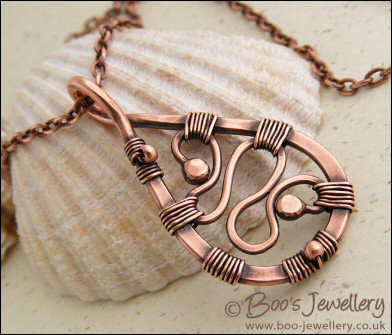 Squiggle filled antiqued copper teardrop pendant