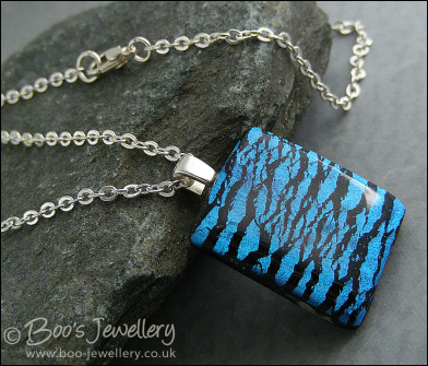 Faux dichroic style polymer clay pendant