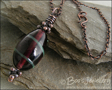 Aubergine and green glass pendant with molten buds