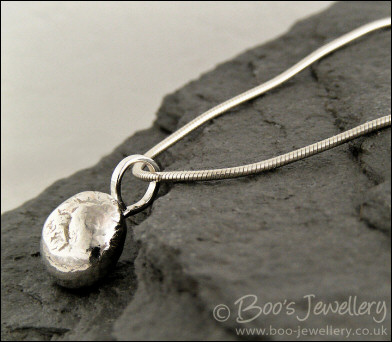 Silver molten pebble pendant