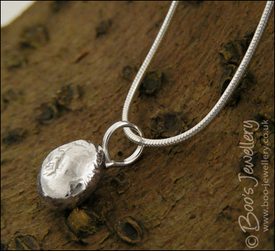 Silver molten pebble pendant