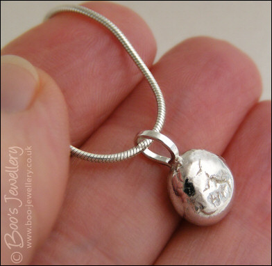 Silver molten pebble pendant