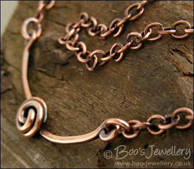 Rosebud knot antiqued copper necklace