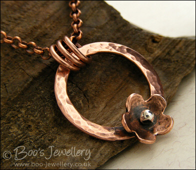 Hammered copper ring and flower necklace