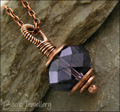 Faceted amethyst glass and copper pendant on chain