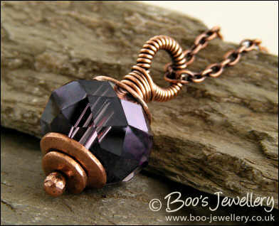 Faceted amethyst glass and copper pendant on chain