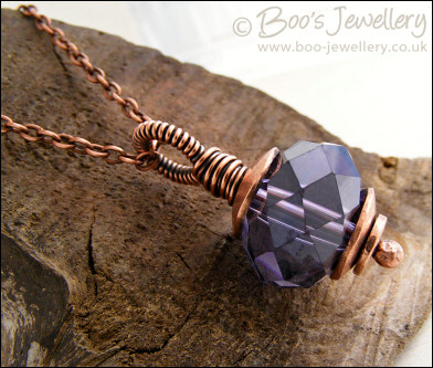 Faceted amethyst glass and copper pendant on chain
