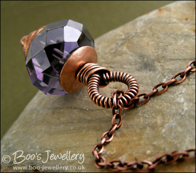 Faceted amethyst glass and copper pendant on chain