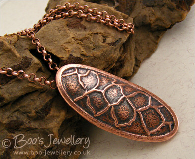 Fir cone textured copper clay pendant on chain
