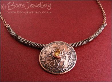 Domed pendant with champagne CZ stone on rope necklace