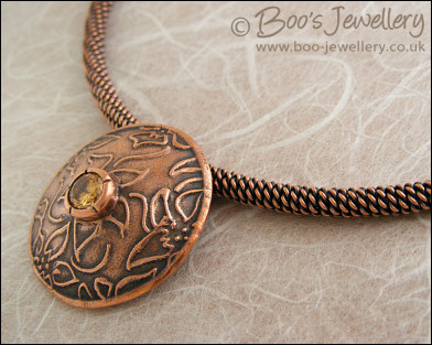 Domed pendant with champagne CZ stone on rope necklace