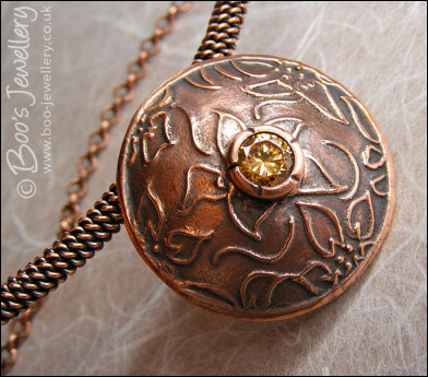 Domed pendant with champagne CZ stone on rope necklace