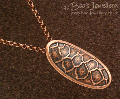Fir cone textured copper clay pendant on chain