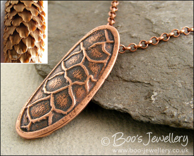Fir cone textured copper clay pendant on chain
