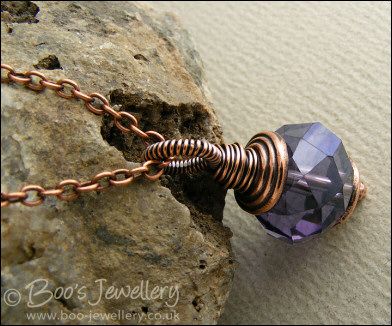 Large amethyst faceted crystal pendant on chain