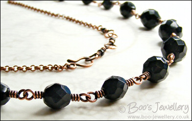 Jet fire polished crystal and copper necklace with earrings