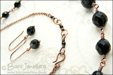 Jet fire polished crystal and copper necklace with earrings