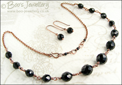 Jet fire polished crystal and copper necklace with earrings
