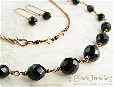 Jet fire polished crystal and copper necklace with earrings